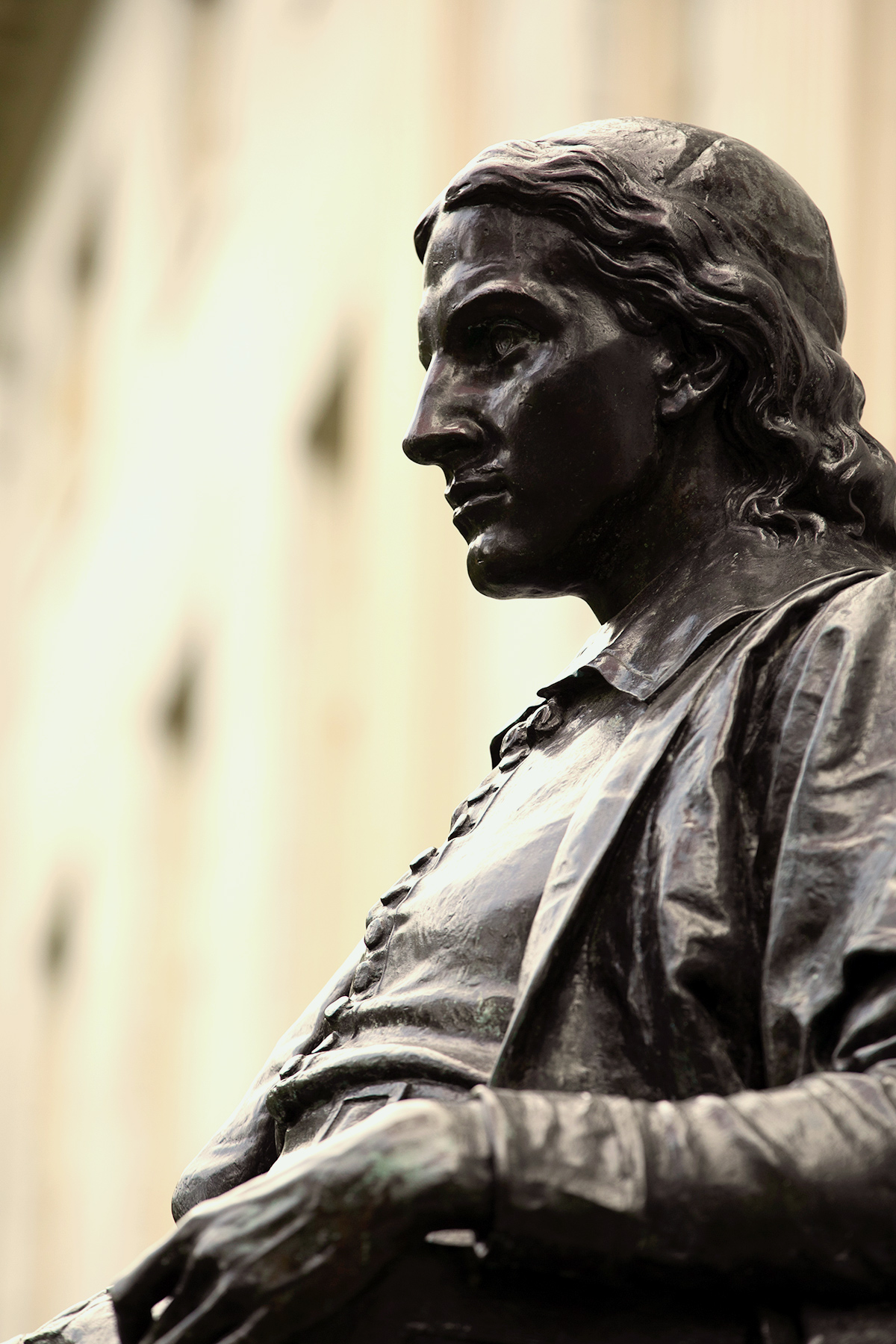 statue of John Harvard in Harvard Yard
