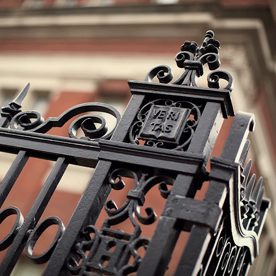 Gate at Harvard with the logo, Veritas (Truth), from Harvard & the Legacy of Slavery